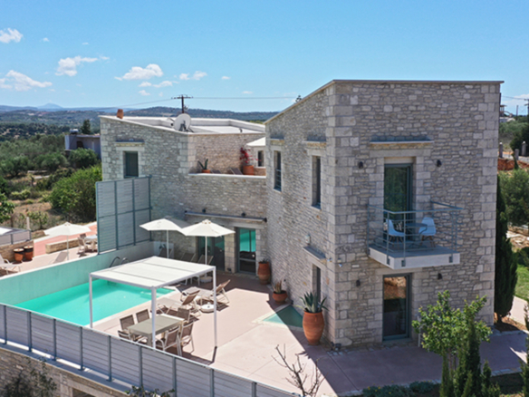 Two bedroom stone villa with pool in Panormo